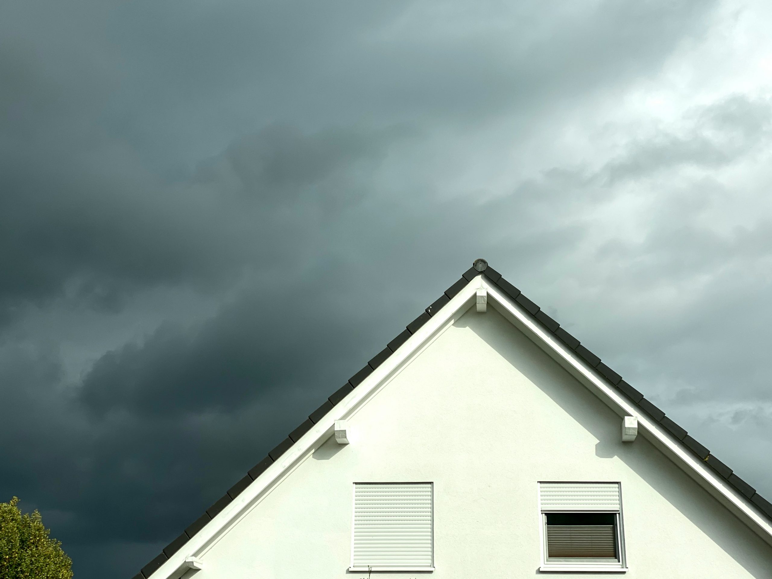 roof under gloomy skies